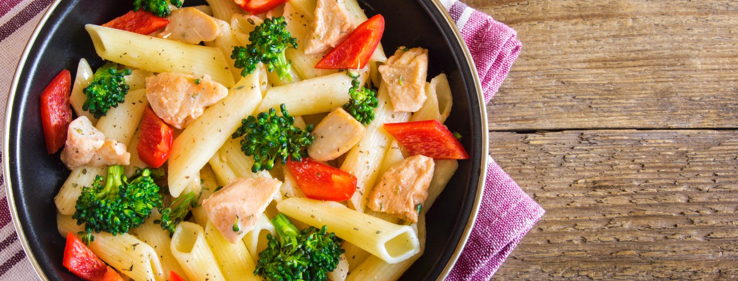 Cheesy Chicken Pasta with broccoli and peppers.