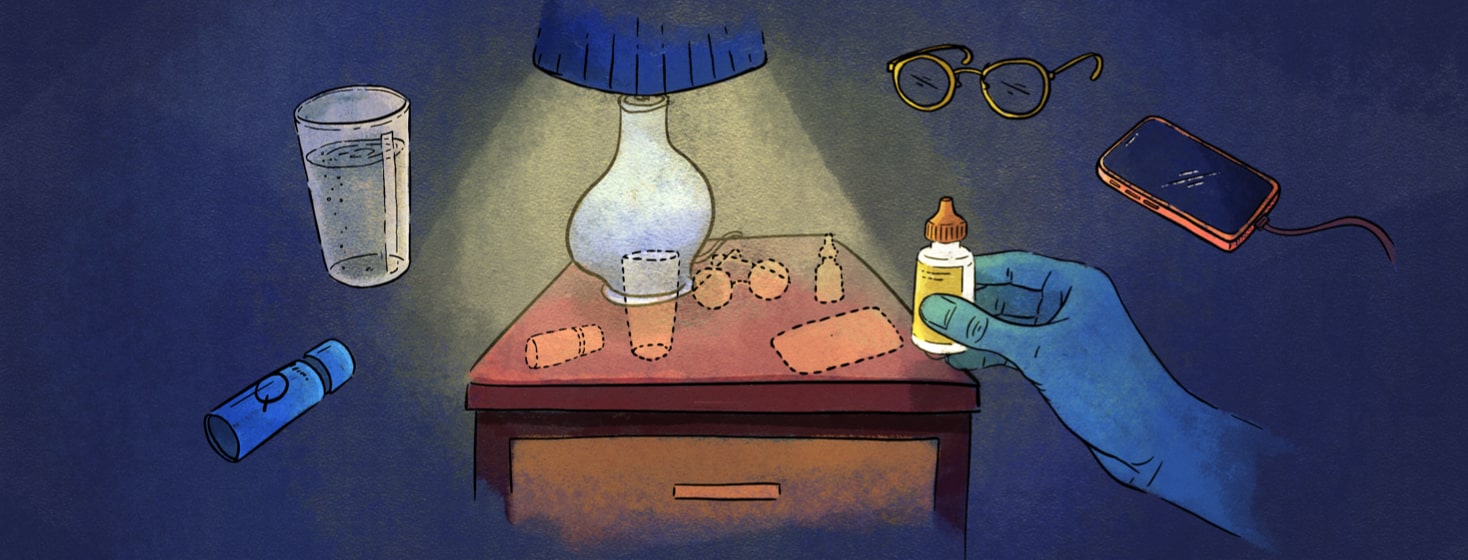 A nightstand with a water, glasses, eye drops, phone, and The Q surrounding it
